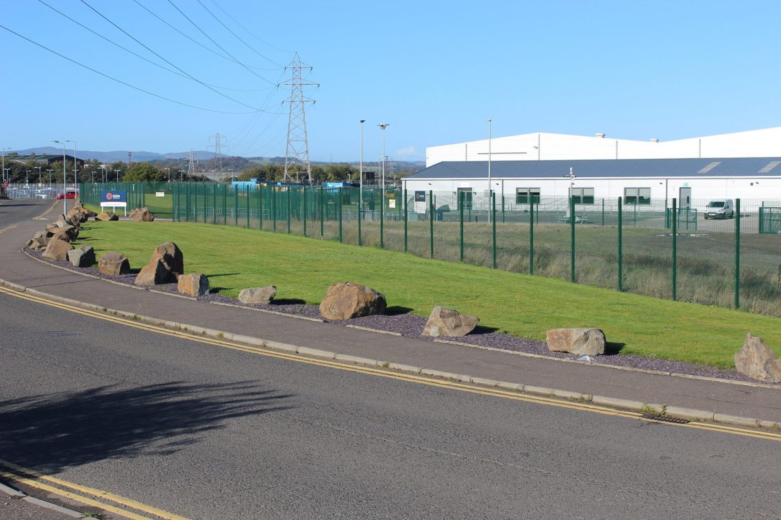 Lochrin 358™ fencing installed around an industrial unit.
