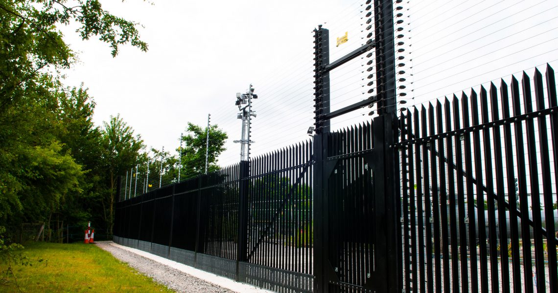 A black Lochrin Combi CPNI fencing installation.