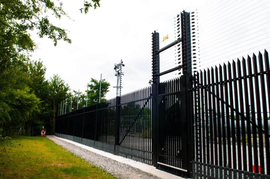 A black Lochrin Combi CPNI fencing installation.