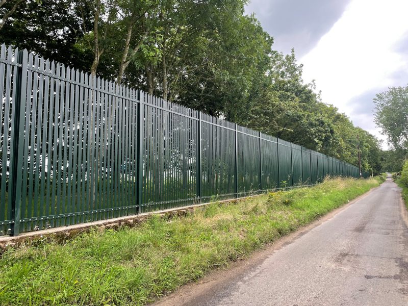 Lochrin Combi SL2 steel palisade used along the perimeter of a water utility site.