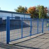 Lochrin FlatGUARD fencing with a vehicle entry gate.