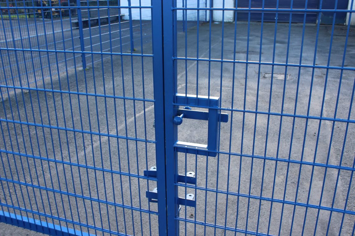 A gate opening on the Lochrin FlatGUARD™ fencing system.