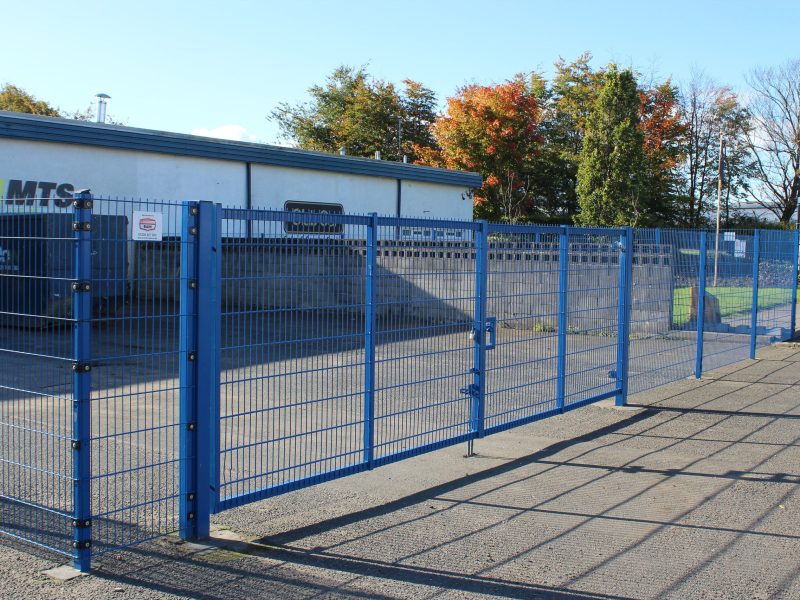 Lochrin FlatGUARD™ mesh fencing with a vehicle entry gate.