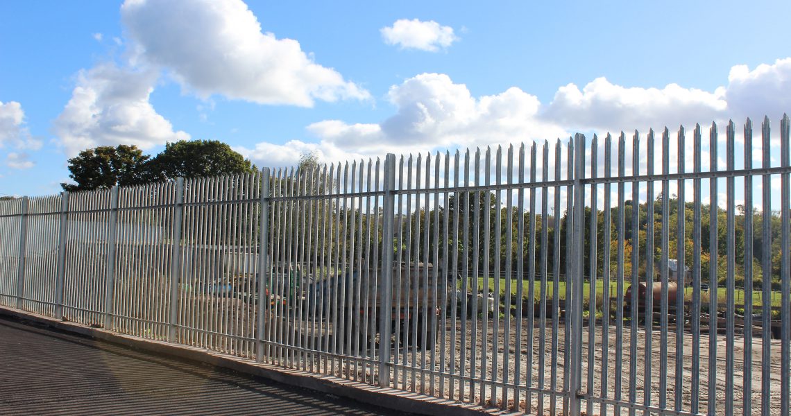 Lochrin Palisade fencing alongside an industrial unit.