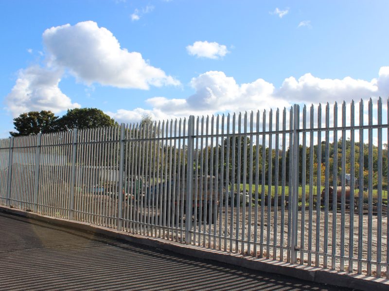 Lochrin Palisade fencing alongside an industrial unit.
