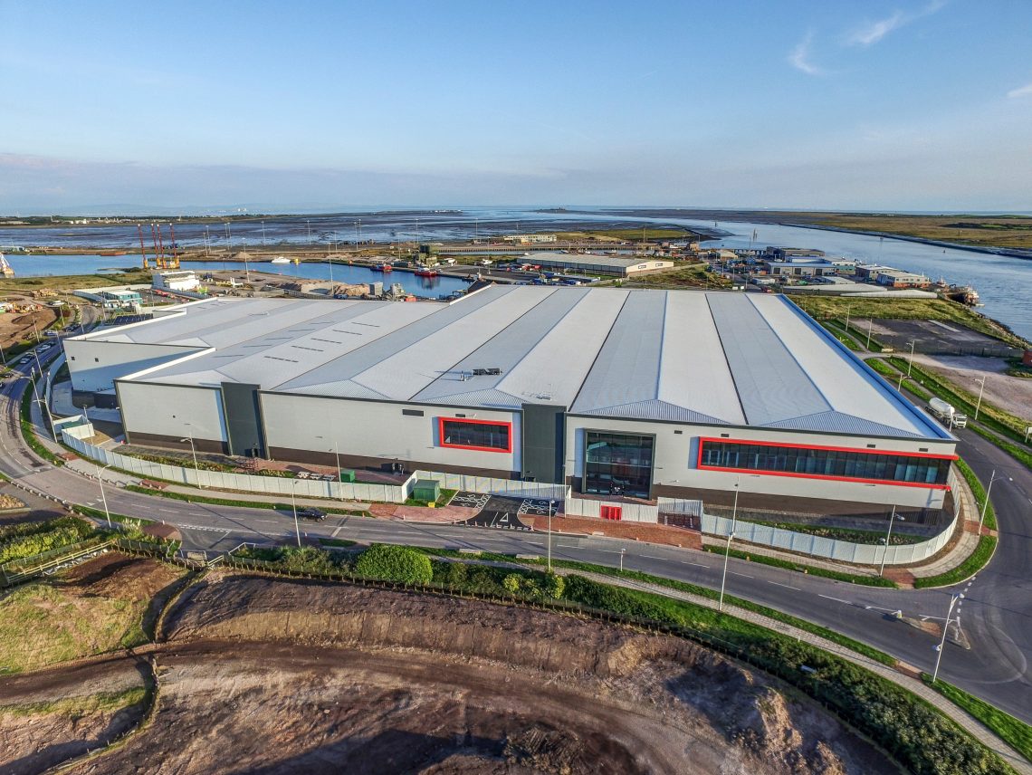 A powder coated steel palisade fence in grey.